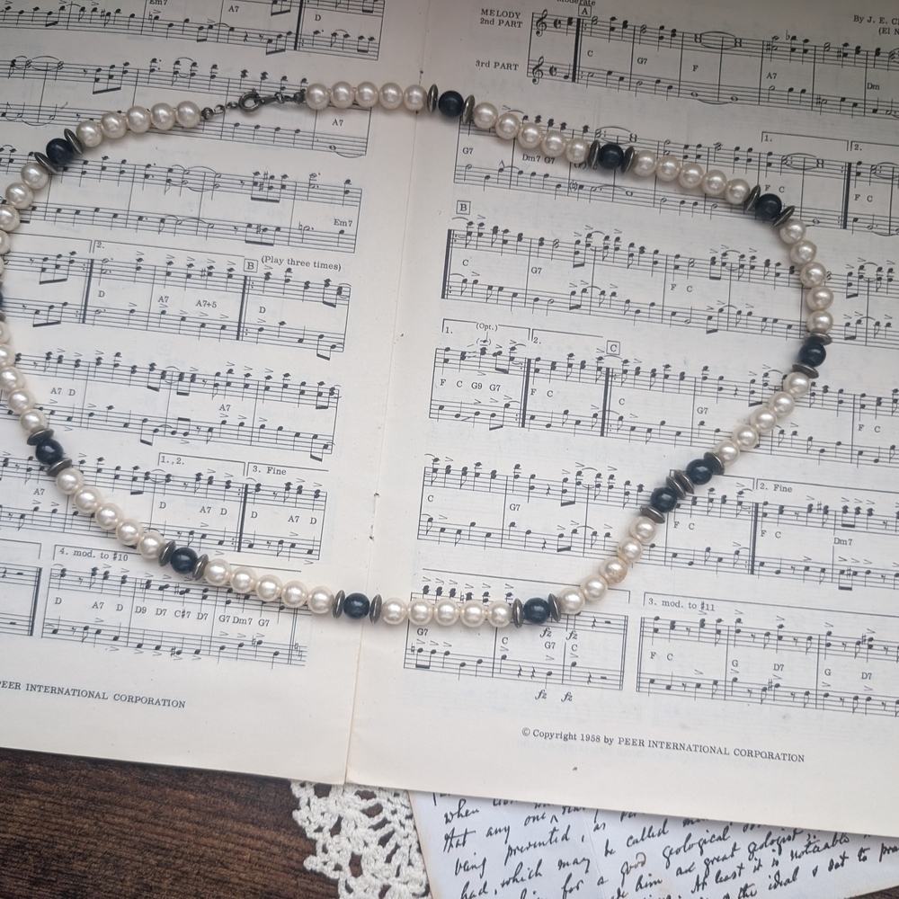 Elegant Pearl and Black Bead Necklace